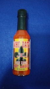 Who Dat Red Zone hot sauce bottle